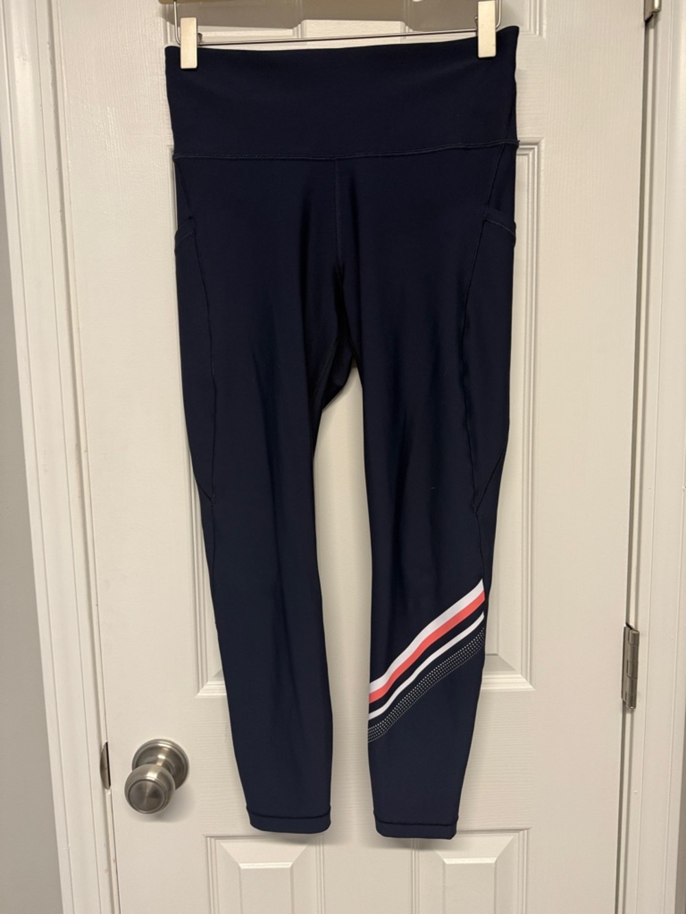 Athleta Navy Leggings with Red and White Ankle Stripes